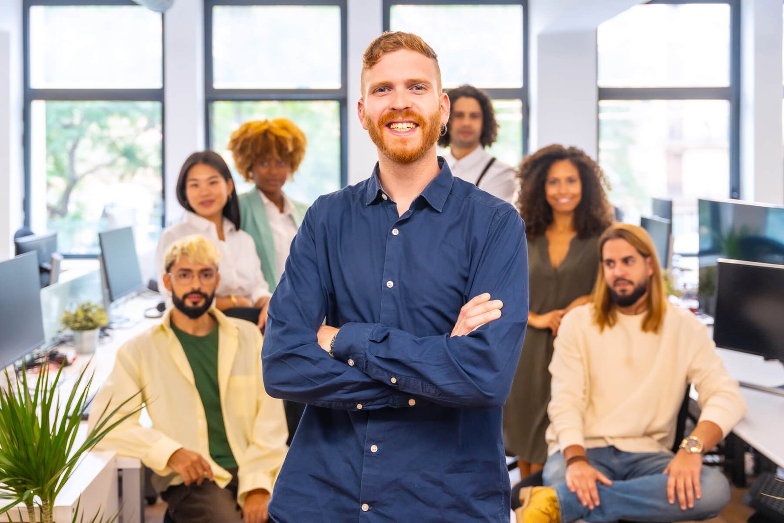Manager Standing Proud Surrounded By His Team In A 2023 11 27 05 01 52 Utc 1 1